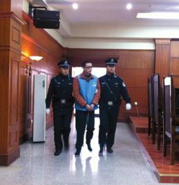 趙勇被帶上法庭。