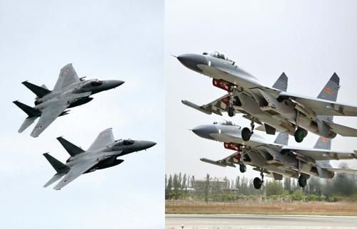 29日，中國空軍查證了進(jìn)入東海防空識別區(qū)的美日軍機(jī)，左圖為進(jìn)入防空識別區(qū)的日本F-15戰(zhàn)機(jī)(資料圖)，右圖為當(dāng)天起飛的中國殲-11飛機(jī)(資料圖)。