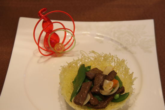 雀巢爆羊柳。 花惠生 供圖